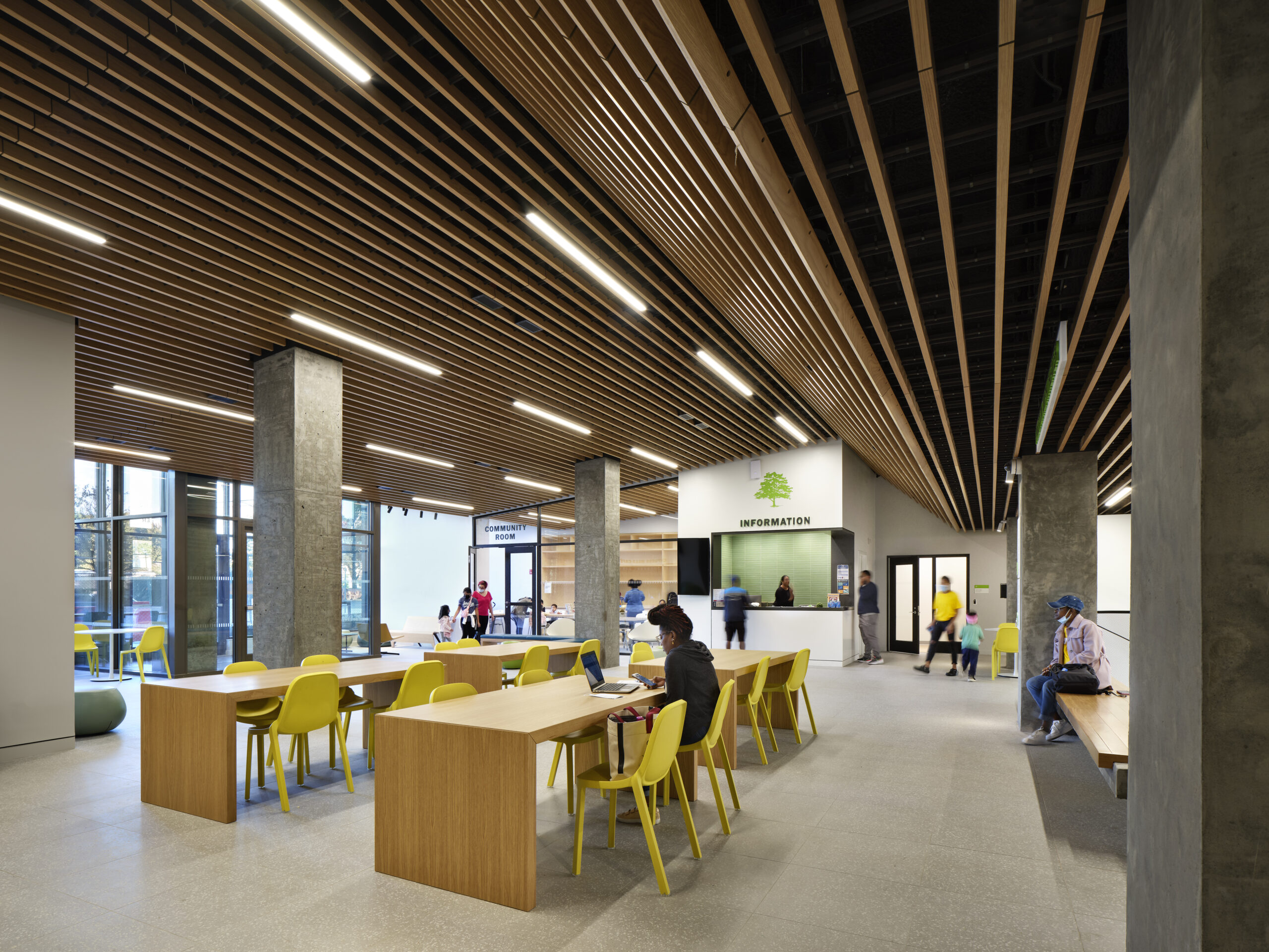 Common meeting room with detailed lighting design integrated into the ceiling.