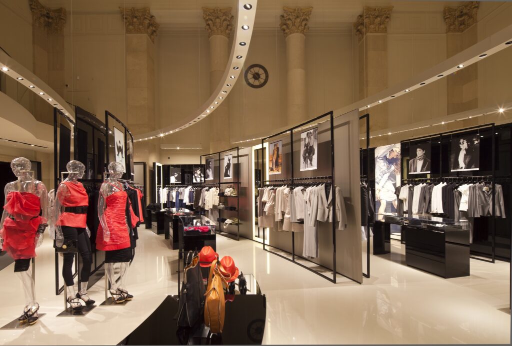 Retail lighting design for Emporio Armani integrating suspended accent lighting within the historic San Francisco interior.