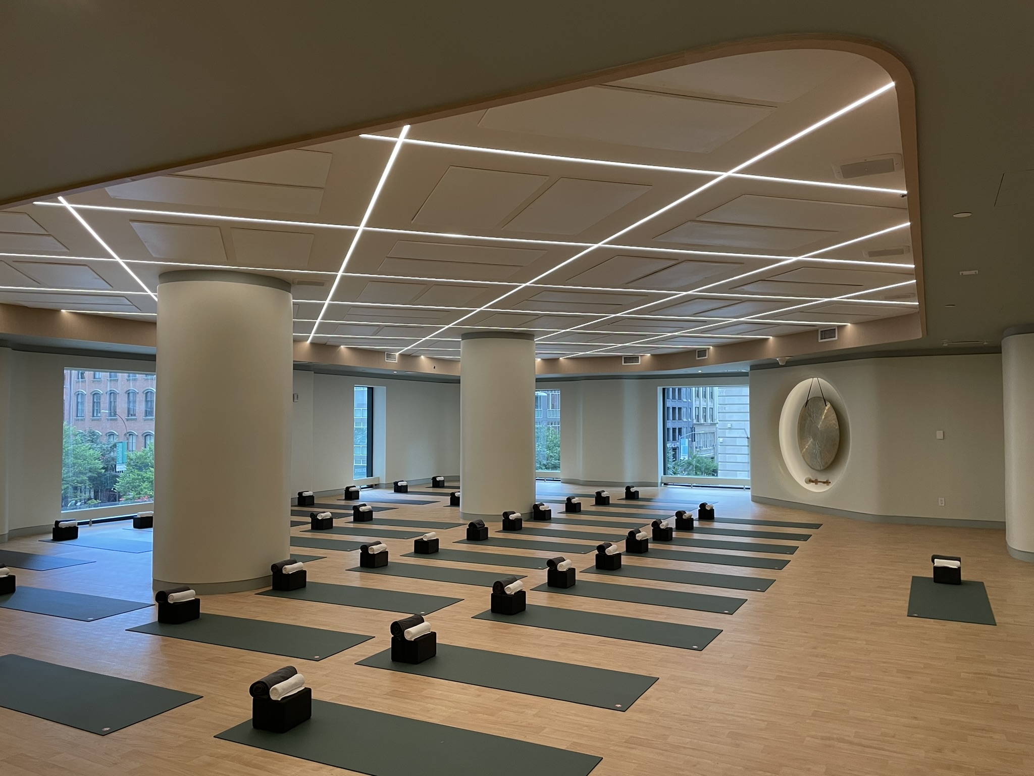Chelsea Piers Fitness wellness studio with graphic recessed linear ceiling lighting